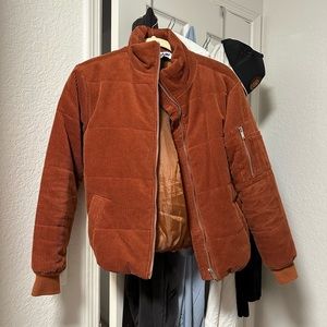 Burnt orange puffer coat